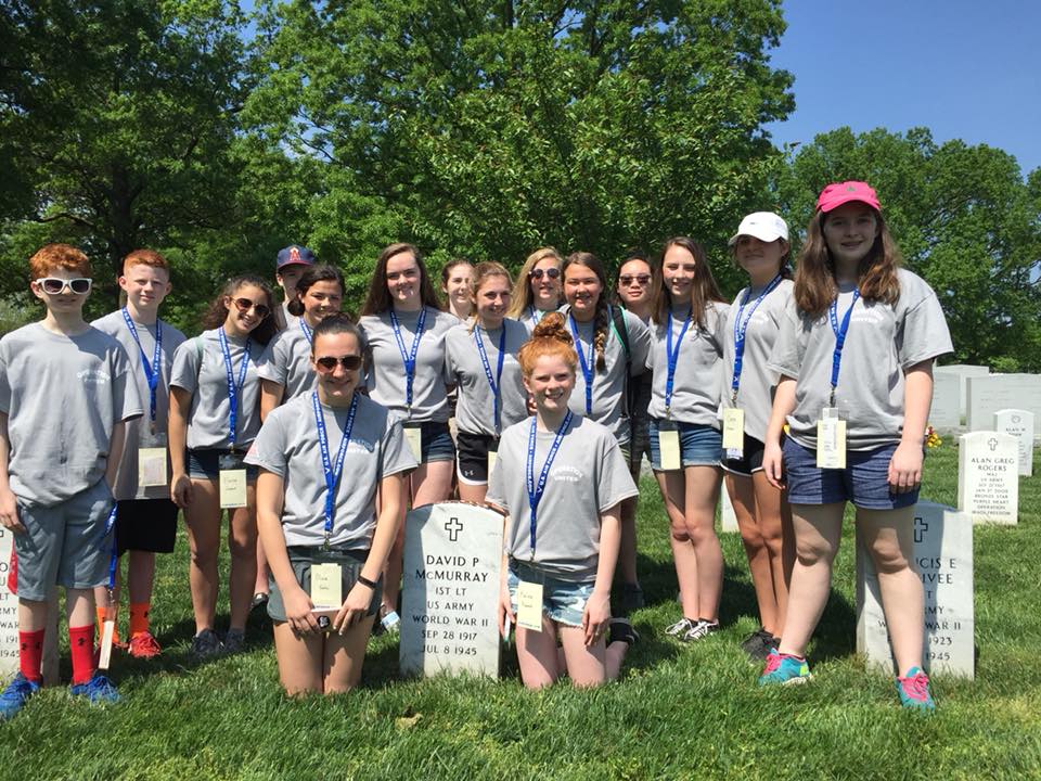 Melrose Veterans Memorial Middle School students at the grave of Lt. David McMurray