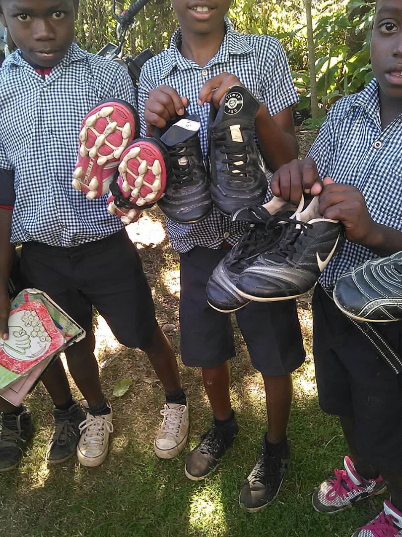 Haitian children with donated items