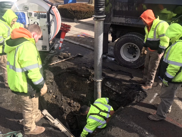 Photo of City Workers Fixing Water Leak
