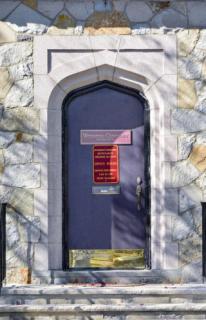 purple door of cemetery office