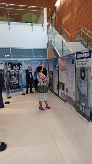 Woman looking at Ukrainian Exhibit at Salem State University