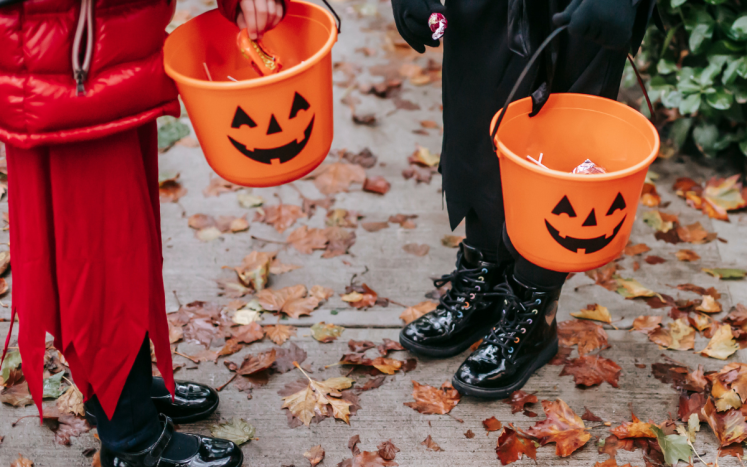 Children Trick or Treating in costumes