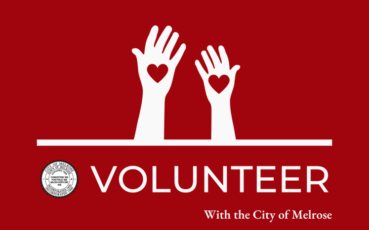 Volunteer with the City of Melrose: Hands in the air with hearts in their palms.